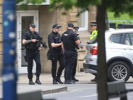 Armed police in Manchester city centre on Tuesday morning