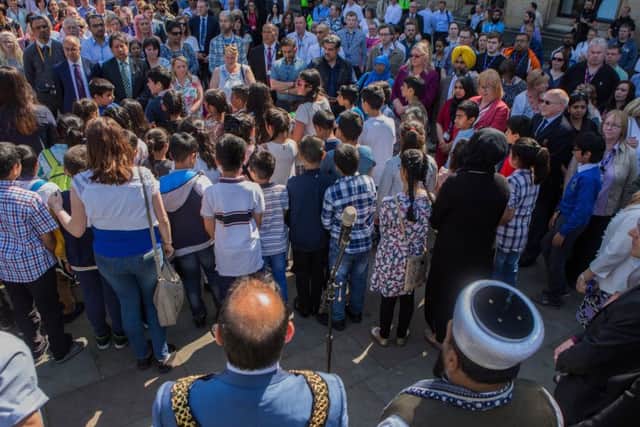 Community members come together in Centenary Square in Bradford. PIC: SWNS