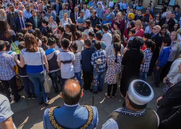 Community members come together in Centenary Square in Bradford. PIC: SWNS