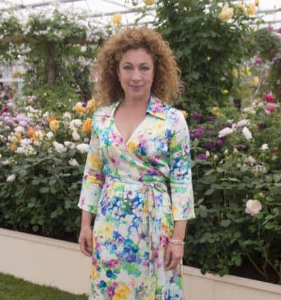 Alex Kingston at the Chelsea Flower Show, wearing an easy floral wrap dress: Victoria Jones/PA Wire