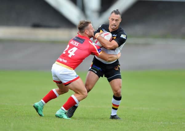 Dane Chisholm, right, is back in Bradford Bulls colours today against Hull KR.  Picture: Tony Johnson.