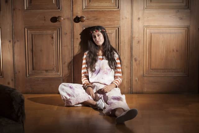 Striped tee and jumpsuit mmade with organic cottons and natural dyes by Beth Redshaw of Harrogate College.
