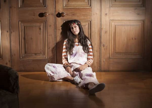 Striped tee and jumpsuit mmade with organic cottons and natural dyes by Beth Redshaw of Harrogate College.
