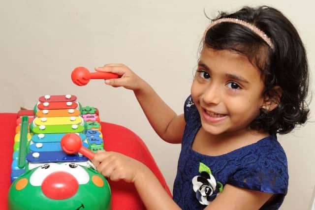 Talented: Laasya Chigurupati ,aged three of Beeston , Leeds, who can play 33 songs on the xylophone. Picture by Steve Riding.