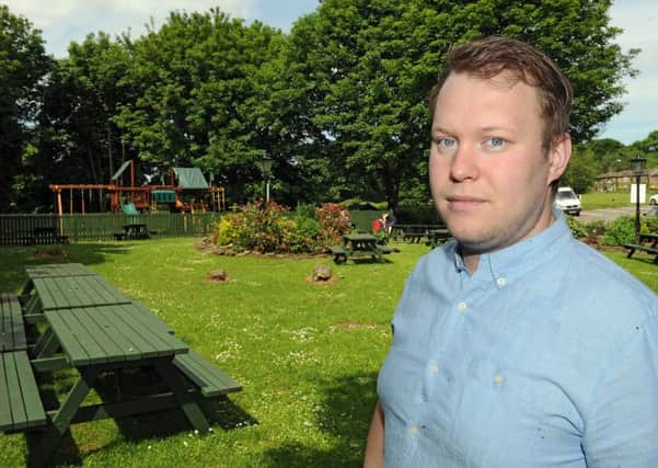 Licensee Scott Westlake in the beer garden at The Myrtle pub, where smoking is to be banned from June 1.