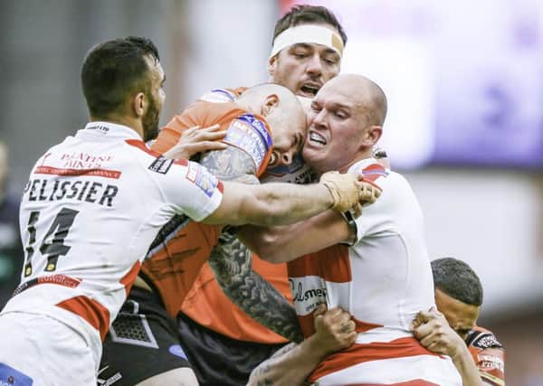 Intense: Tigers' Nathan Massey locking horns with Corey Paterson of Leigh Centurions.
Picture: SW Pix