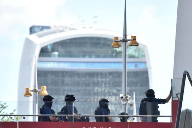 Armed police near the Shard this morning