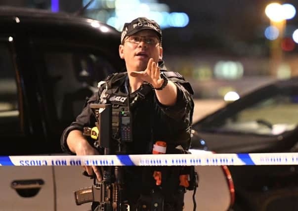 Armed police officer on London Bridge as  police deal with a "major incident" at London Bridge. 
Picture: Dominic Lipinski/PA