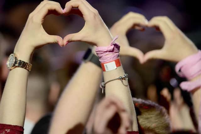 Fans pay tribute to those who were killed and injured in the Manchester terrorist bombing.