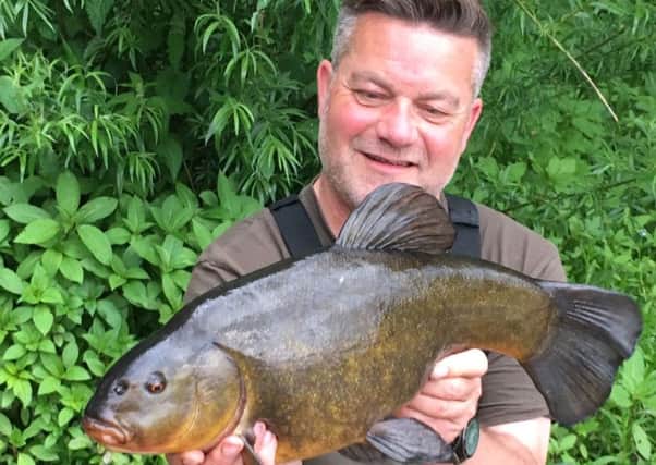 Darren Starkey with big tench

caught from Leeds & District's Knotford Lagoon.