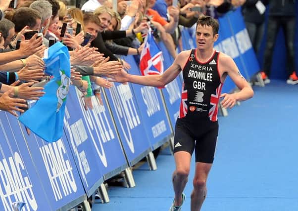 BACK HOME: Jonny Brownlee greets the crowd finishing second in  the 2016 ITU World Triathlon Leeds in Millenium Square.  Picture: Tony Johnson