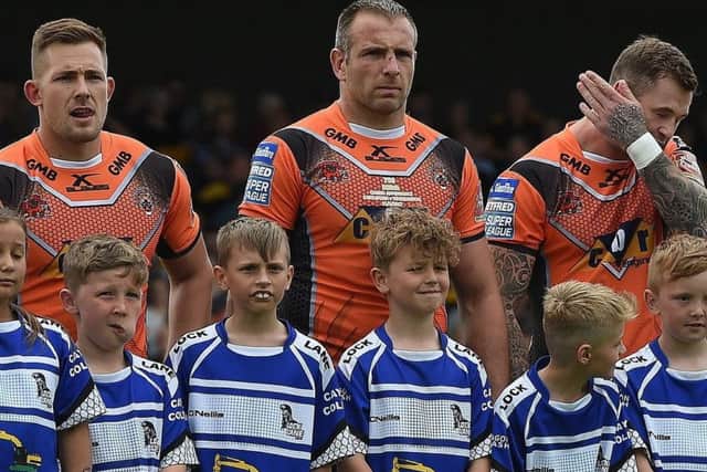 Five-try Greg Eden, left, and Andy Lynch, centre, who was making his 500th career appearance, playing for Cas against Warrington on Sunday. PIC: Matthew Merrick/rlphotos.com