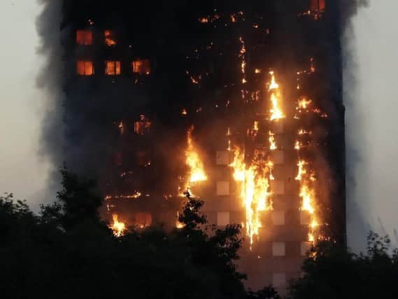 The Grenfell Tower is engulfed in flames (AP)