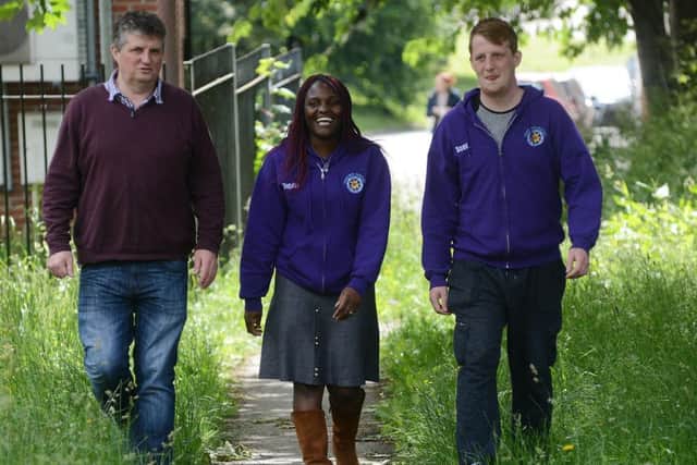 9 June 2017.....Bill Graham runs a walking group, from New Wortley Community Centre, for middle aged men in Leeds in what was one of the highest suicide areas of the city.Bill is pictured with support workers Tendai Nkala and Scott Kaye. Picture Scott Merrylees