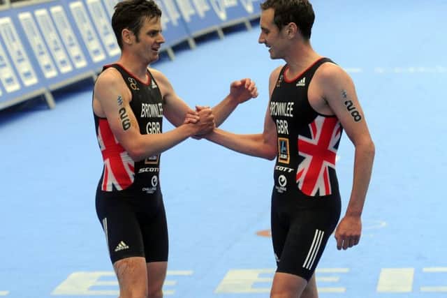 Alistair and Jonny Brownlee embrace at the finish line in Leeds
