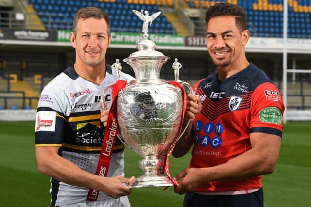 Danny McGuire and Misi Taulapapa with the Ladbrokes Challenge Cup.