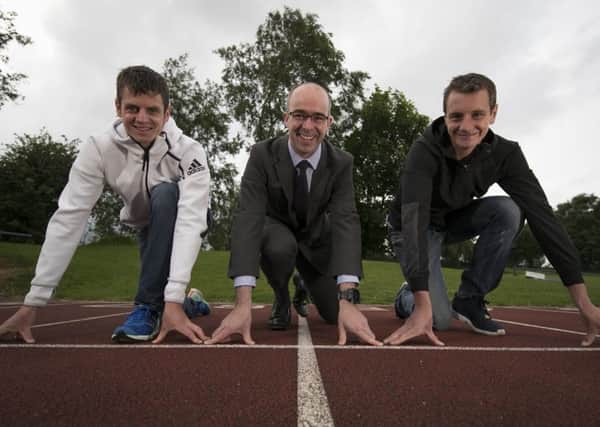 Jonny  and Alistair Brownlee with Simon Usher Persimmon Homes Yorkshire managing director.
