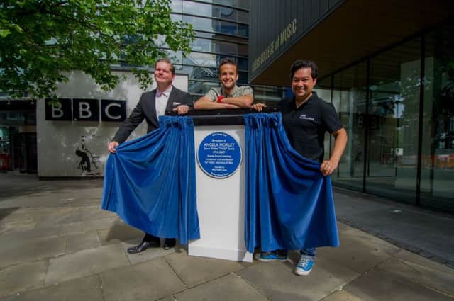 Prof 
Joe Wilson with BBC presenters Johnny I'Anson, and Nick Ahad unveil a blue plaque in memory of musician Angela Morley,