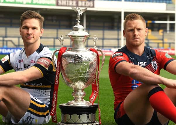 Leeds Rhinos Matt Parcell and Featherstone Rovers  Keal Carlile with the Ladbrokes Challenge Cup Trophy ahead of tonight's quarter-final.