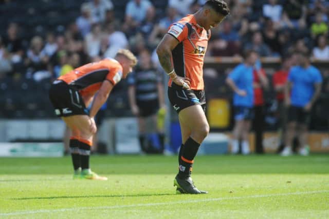 Dejected Castleford Tigers players after Sunday's Challenge Cup exit. PIC: Steve Riding