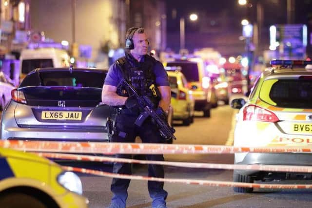 Armed officers in London