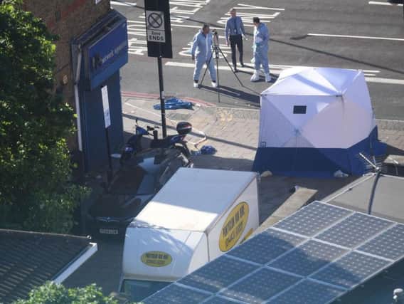 A forensic tent stands next to a van in Finsbury Park, north London, where one man has died, eight people taken to hospital and a person arrested after the vehicle struck pedestrians. Picture: Victoria Jones/PA Wire