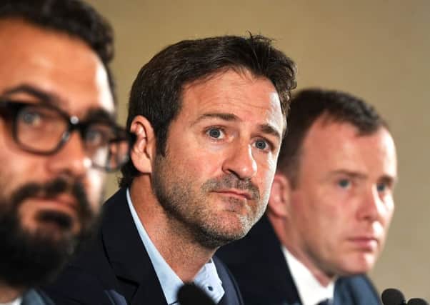 New Leeds United head coach Thomas Christiansen at Elland Road today flanked by director of football, Victor Orta, left, director of football and managing director, Angus Kinnear.  Picture: Bruce Rollinson
