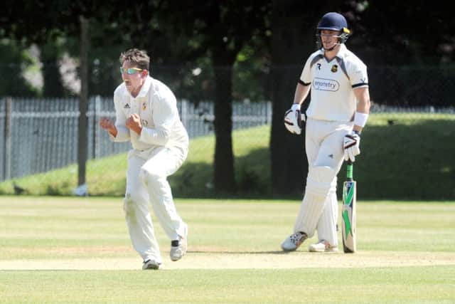 Jack Hughes, of Townville, celebrates getting the wicket of Pudsey St Larence batter Charlie Best LBW. PIC: Steve Riding