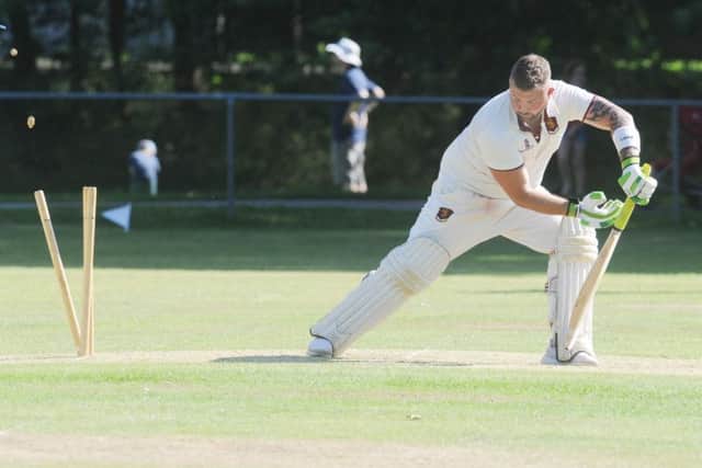 Mark McEneaney, of Horsforth Hall Park, is bowled by Michael Slater for 33. PIC: Steve Riding