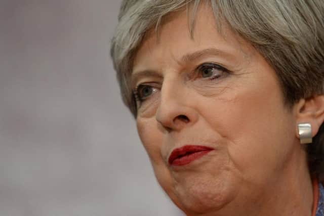Theresa May.
