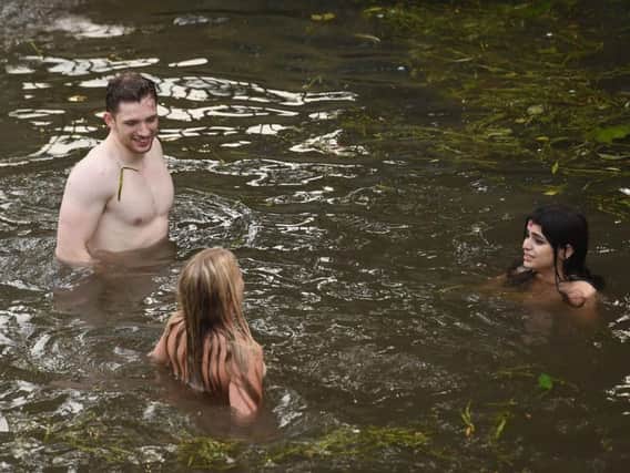 Students skinny dipping