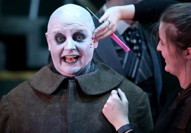 Les Dennis as Uncle Fester, getting ready to perform in The Addams Family musical. PIC: PA