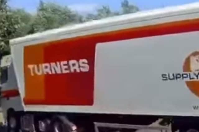 The Turners lorry careers to one side. (Photo: YouTube).