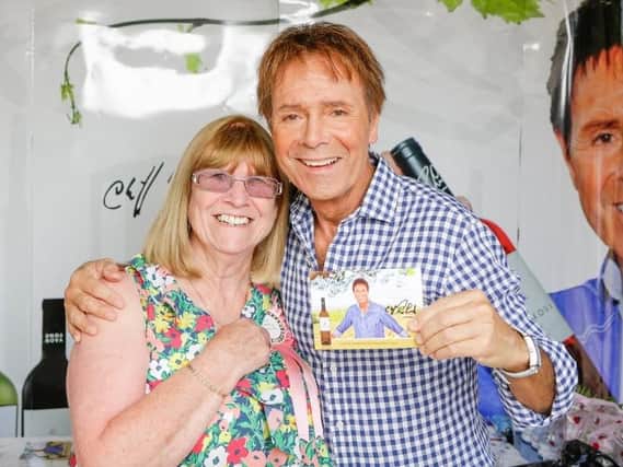 Christine Sutcliffe with Sir Cliff Richard in Portugal.