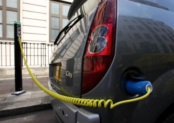 File photo of an electric car being recharged.
Photo by Dominic Lipinski/PA Wire