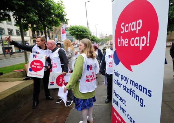 Nurses demonstrate at Victoria Gardens, in Leeds, last month