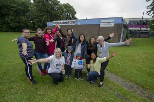 11 July 2017. Picture James Hardisty. 
Beeston Village Community Centre, off St Anthony's Drive, Beeston, Leeds, has been awardedÂ£ 1 million from the Lottery grant to rebuild the centre. Pictured are users, volunteers and staff celebrating the announcement.
