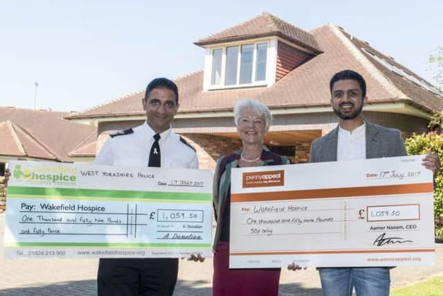 Chief Superintendent Mabs Hussain (left) with Tina Turner of Wakefield Hospice and Penny Appeal chairman Adeem Younis.