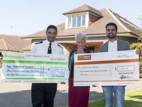 Chief Superintendent Mabs Hussain (left) with Tina Turner of Wakefield Hospice and Penny Appeal chairman Adeem Younis.