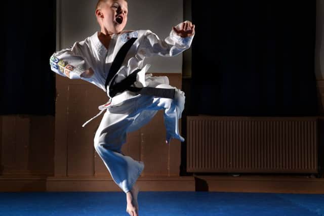Seven-year-old Alfie Oliver has become the youngest in the history of West Yorkshire Schools of Karate and Oriental Arts to receive a black belt in Wadu-Ryu.
18 July 2017.  Picture Bruce Rollinson