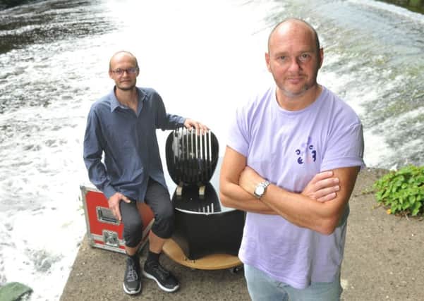 18 July 2017.......   Steve Halliday, right with Hannes Fessmann who makes and plays music with stone, by the River Aire at Newlay, Horsforth in Leeds. Picture Tony Johnson.