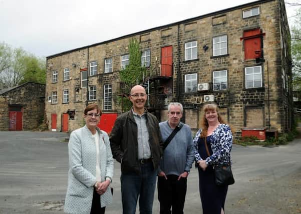 STILL HOPEFUL: Campaigners from Kirkstall Valley Development Trust at Abbey Milsl in Kirkstall. From left: Fiona Butler, Chris Hill, Paul Holdsworth and Adele Rae.
Picture: Jonathan Gawthorpe