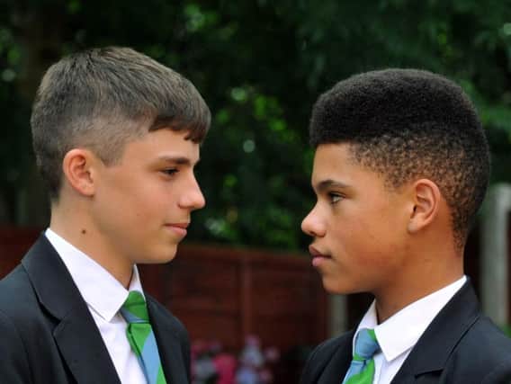 Callum, left and Joshua, right, both 14, have been threatened with isolation at the school due to their 'extreme youth culture' hairstyles