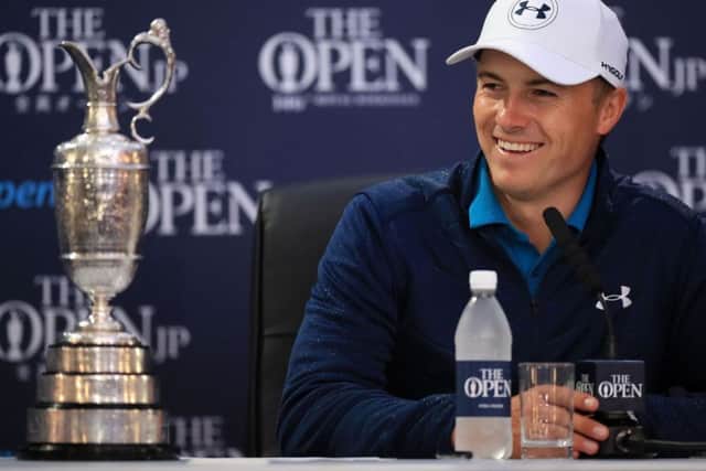 Jordan Spieth celebrates with the Claret Jug in a press conference after winning the Open Championship (Picture: Andrew Matthews/PA Wire).