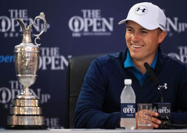Jordan Spieth celebrates with the Claret Jug in a press conference after winning the Open Championship (Picture: Andrew Matthews/PA Wire).