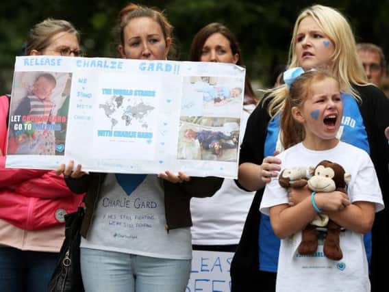 Protesters outside the court supporting Charlie Gard's family
