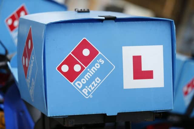 File photo of Domino's Pizza delivery motorcycles. Domino's Pizza has inked an agreement with Amazon Echo that will enable voice ordering for customers as it looks to boost slowing sales growth. PRESS ASSOCIATION Photo. Issue date: Tuesday July 25, 2017. The delivery chain will launch what it called an "industry first" with voice ordering through Amazon's Echo device as of today, as well as introducing GPS tracking for its pizzas. Photo:  Jonathan Brady/PA Wire