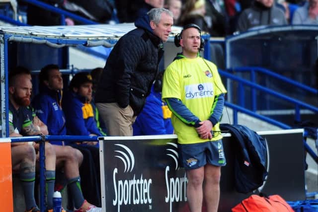 Chris Plume dugout-side with Rhinos head coach Brian McDermott. PIC: Jonathan Gawthorpe