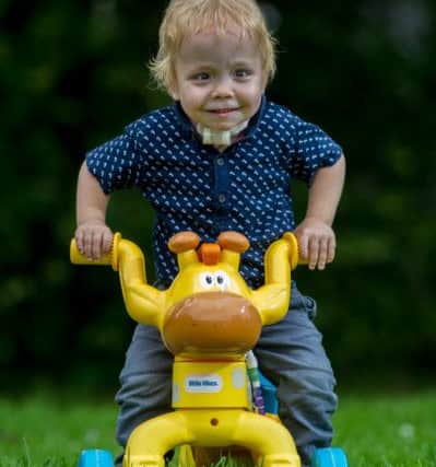 Date: 25th July 2017.
Picture James Hardisty.
George Smith, of Rufforth Drive, Leconfield, East Yorkshire, aged three who is about to have his trachiostomy removed at Leeds General Infirmary later this week (Thursday). It was first fitted at the age of three months when his family were told he would probably not survive his condition. George, spent the first eight months of his life in hospital, and now he's having it removed and is well on the road to recovery.