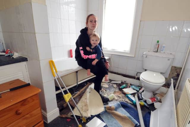 3 August 2017......   Rebecca West with son Oscar, 17 months, whose rented property on Stanley Road in Harehills is infested by snakes. The home is being ripped apart to find the reptiles but the council, housing association and the RSPCA are unable to offer assistance. Picture Tony Johnson.
